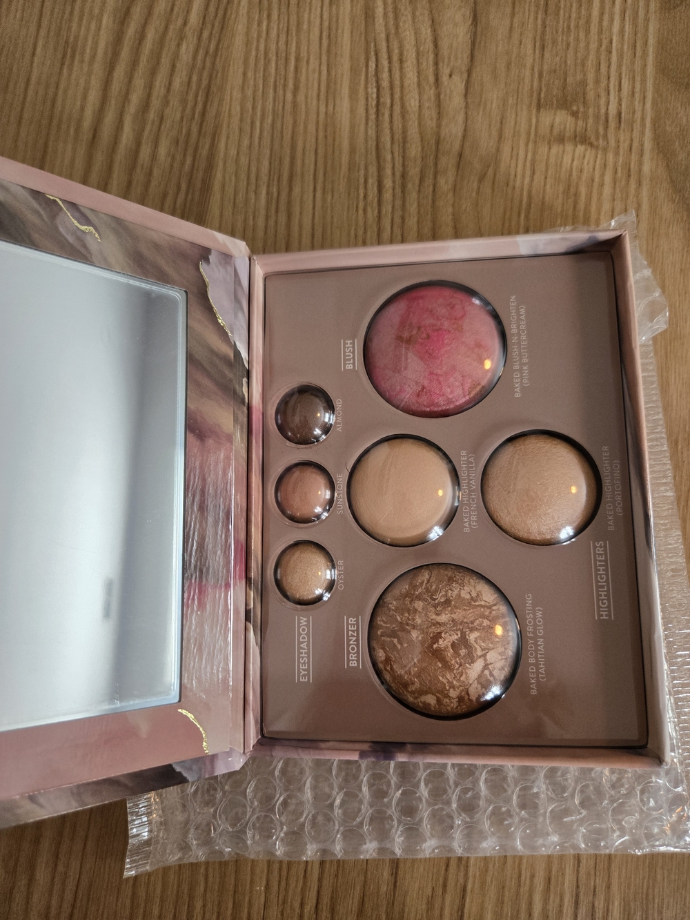 Laura Geller Face Palette with Pink Blush and Bronze Highlighter